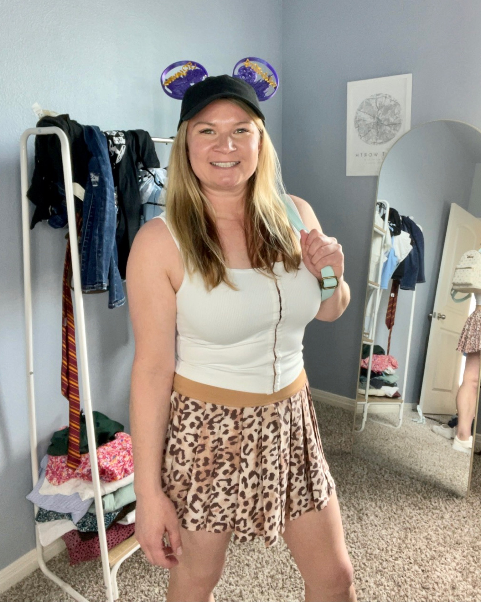 Walt Disney world outfit, animal kingdom outfit, leopard print skort, white tank top, aloha ears, cute Disney outfits, leopard skirt 

#LTKtravel #LTKFind #LTKstyletip