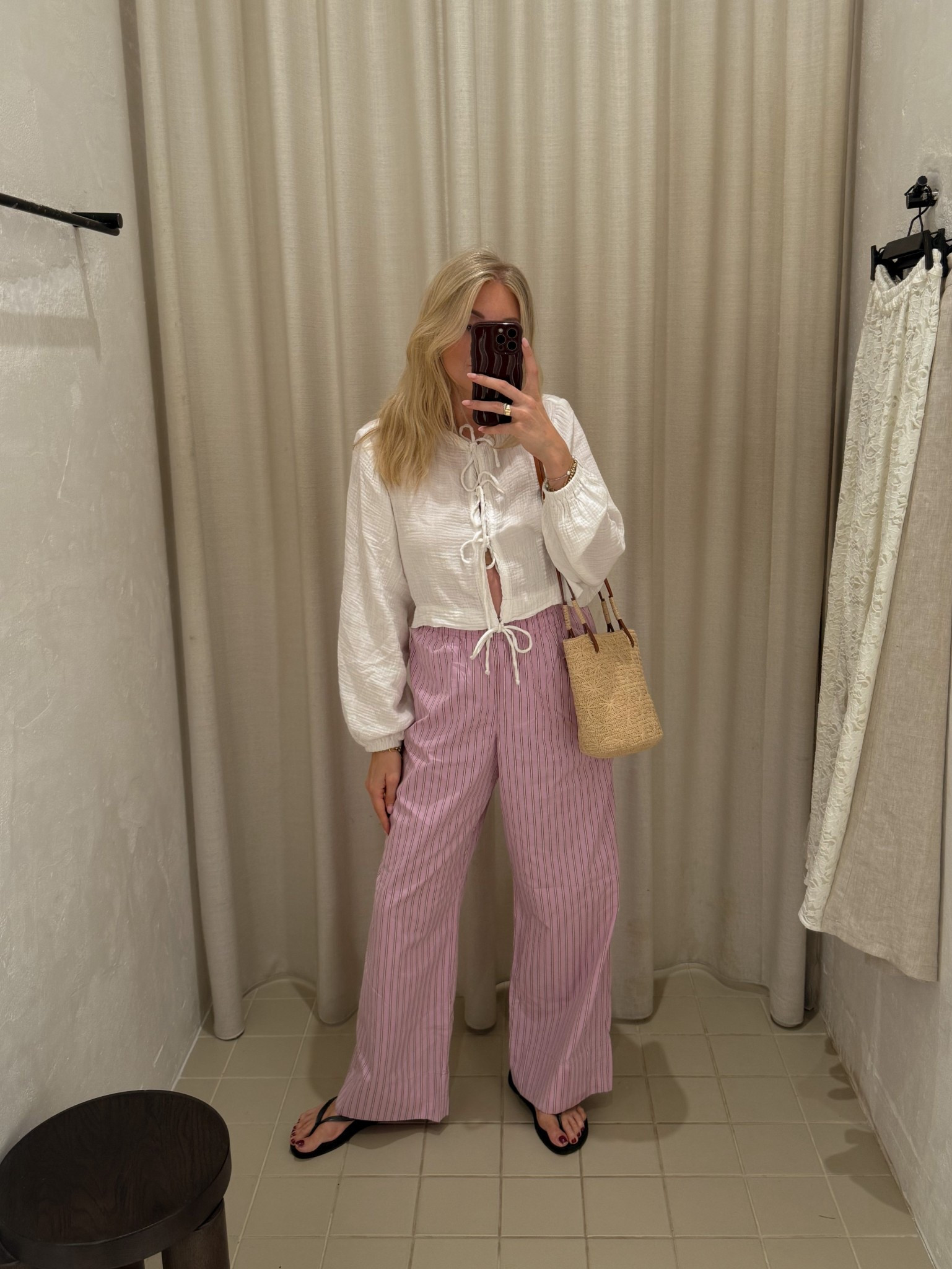Easy summer outfit, holiday outfit, holiday style, summer style, summer trousers, basket bag, sezane bag, straw bag, shoulder bag, pink trousers, striped trousers, arket trousers, white top, tie top, summer top, 