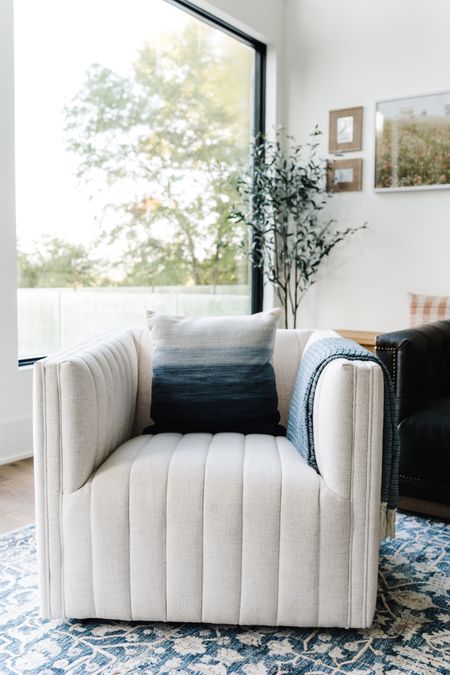 Every living room needs a swivel chair.

#livingroomdecor #swivelchair #ivorychair #coastalliving 

#LTKhome #LTKfamily