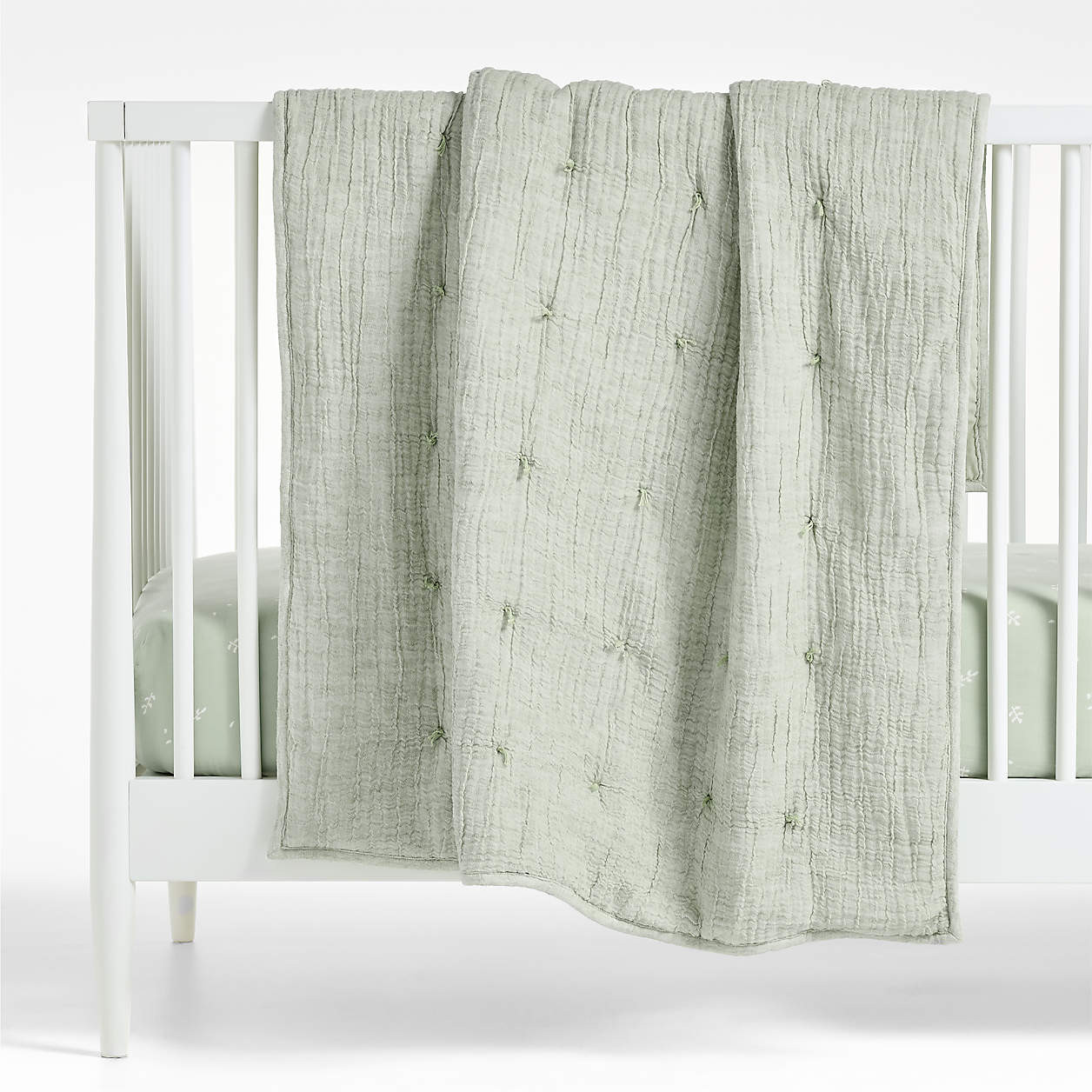 Aire Muted Teal Crinkle Hand-Quilted Organic Cotton Baby Crib Quilt + Reviews | Crate & Kids | Crate & Barrel