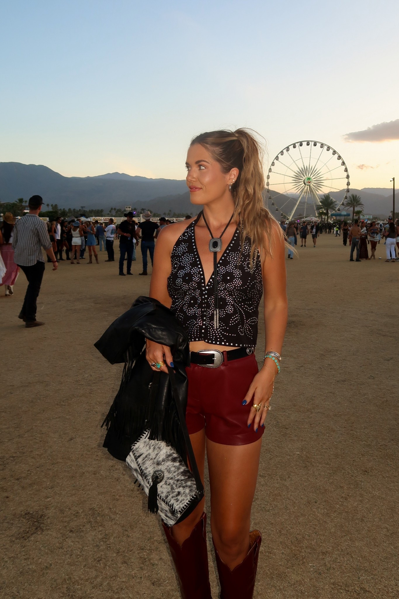 size small in shorts, belt is on my ShopMy, size small in top, and medium in fringe jacket! boots are ariat croc, linking similar. bolo is boot barn 

#LTKFestival #LTKootd #LTKgrwm