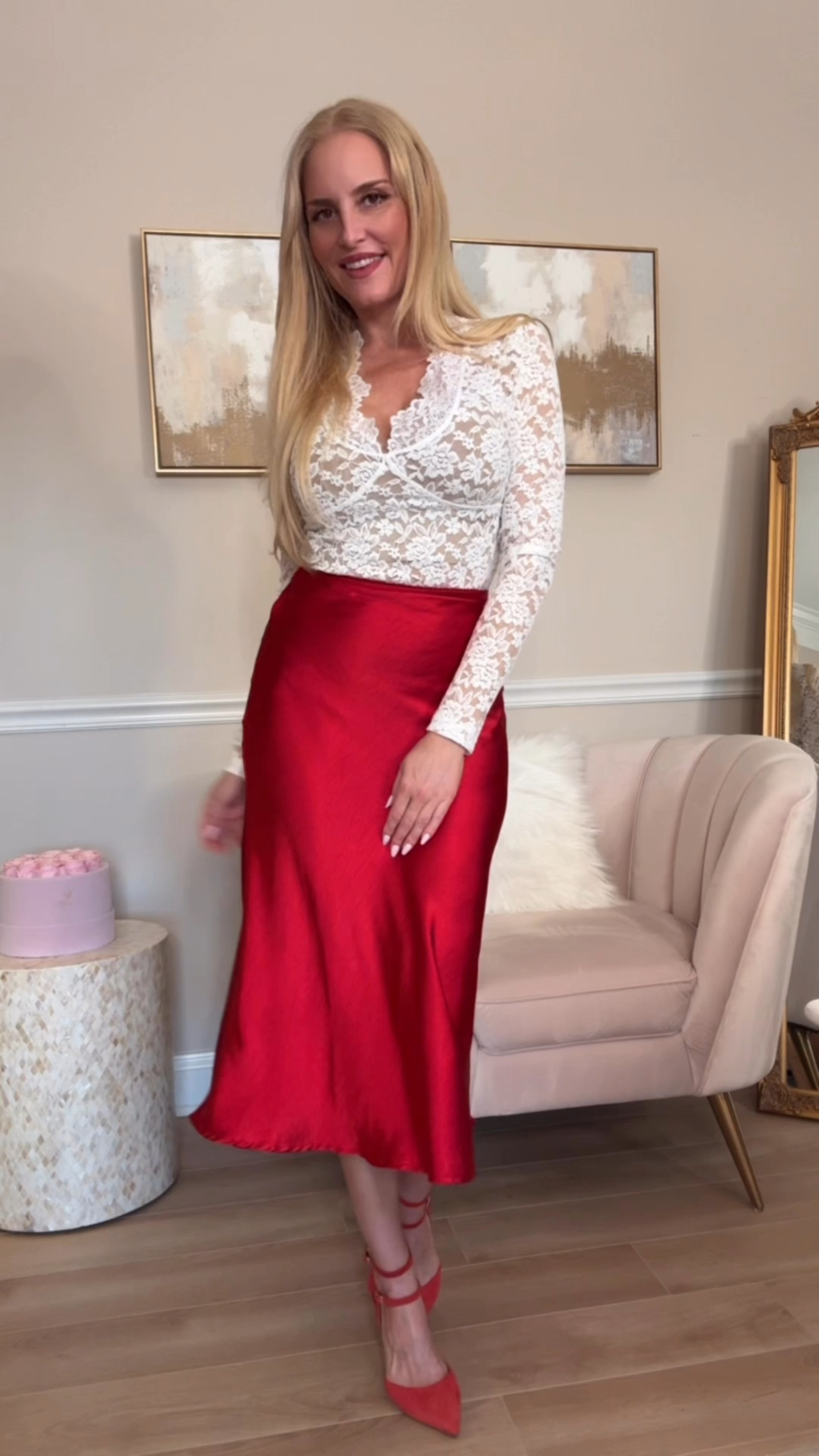 This white lace long sleeve top looks fabulous with a satin red midi skirt. A gorgeous date night look for Valentine's Day. Also adorable for Galentine's Day. Wearing a small in the skirt and top. Also linked some gorgeous red suede pumps and red top handle bags.

#LTKStyleTip #LTKSeasonal #LTKSaleAlert