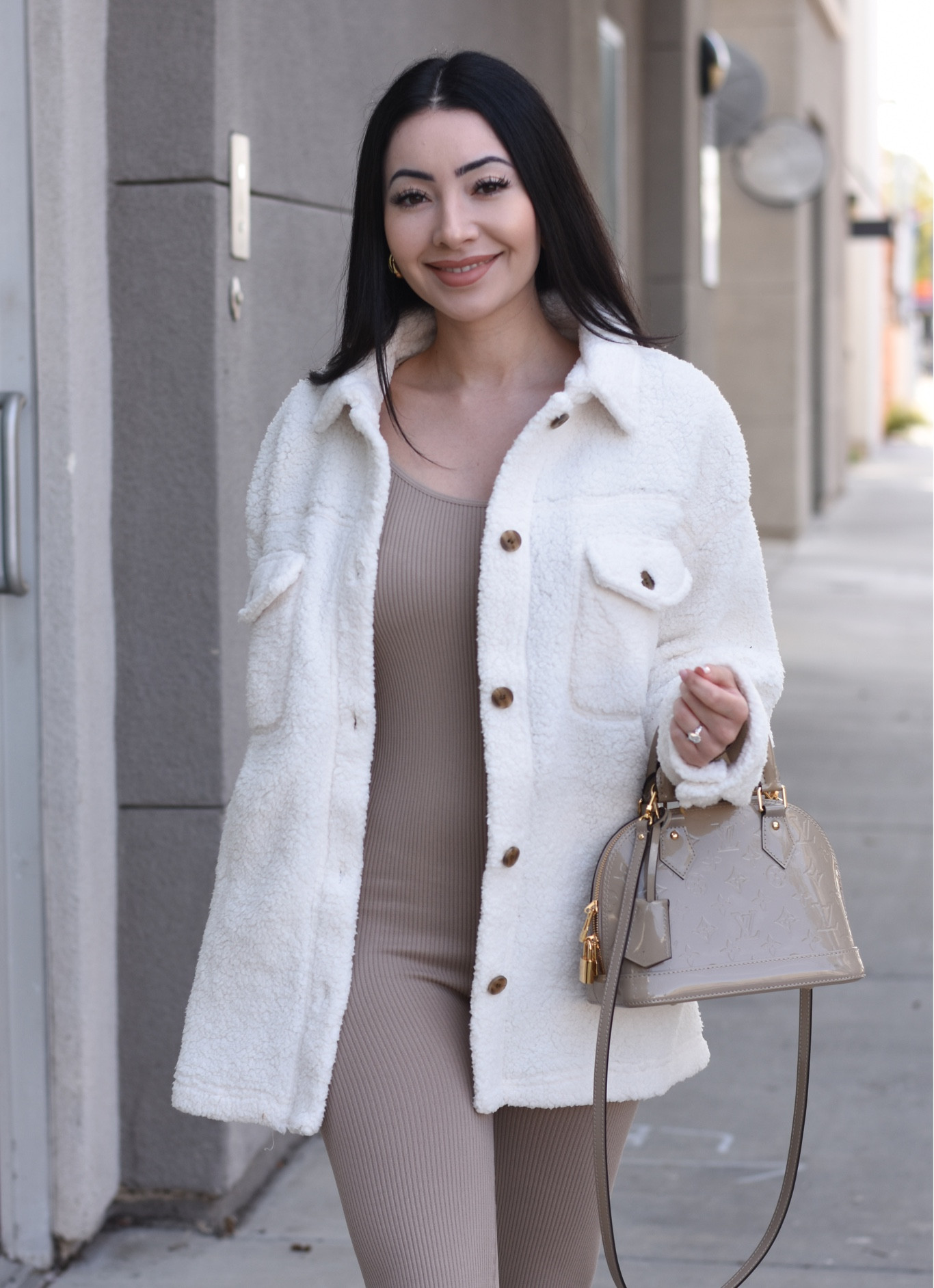Fuzzy Shearling Button Down Shirt Jacket!

This jacket is perfect fall and winter fashion. 

For this comfy look I layered mine over a taupe long sleeve jumpsuit, and accessorized with white tennis shoes and a taupe purse.

This jacket was purchased in-store from Costco, but I could not find it on the website to link. I have linked a few very similar alternatives!

Jumpsuit was from Forever21 but no longer listed on the website ):