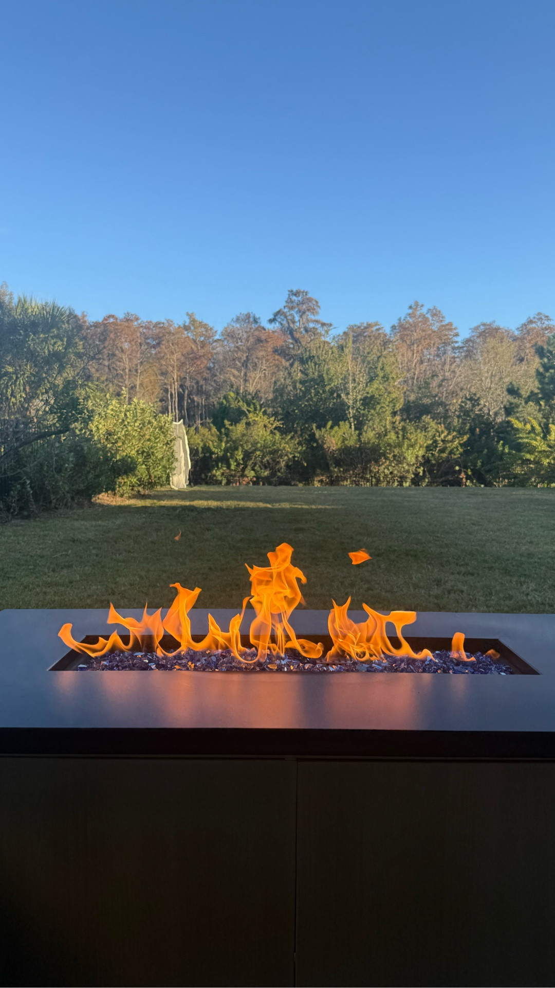 You won’t believe the price of this modern Walmart fire pit to complete your outdoor living space! Check out the similar Pottery Barn version, it’s a total steal of a deal.

I subbed the lava rocks with these blue glass rocks from Lowe’s to complete the modern look for under $400. You will only need one container, just make sure not to cover the fire starter spot completely so it will start-learn from my mistake 🤣

One thing I love about this gas fire pit is that the tank is stored inside, so many fire pits have the gas tank elsewhere on your patio. 

High end
Luxe for less

Entertaining
Family time
S’mores

#LTKHome #LTKSaleAlert #LTKHoliday