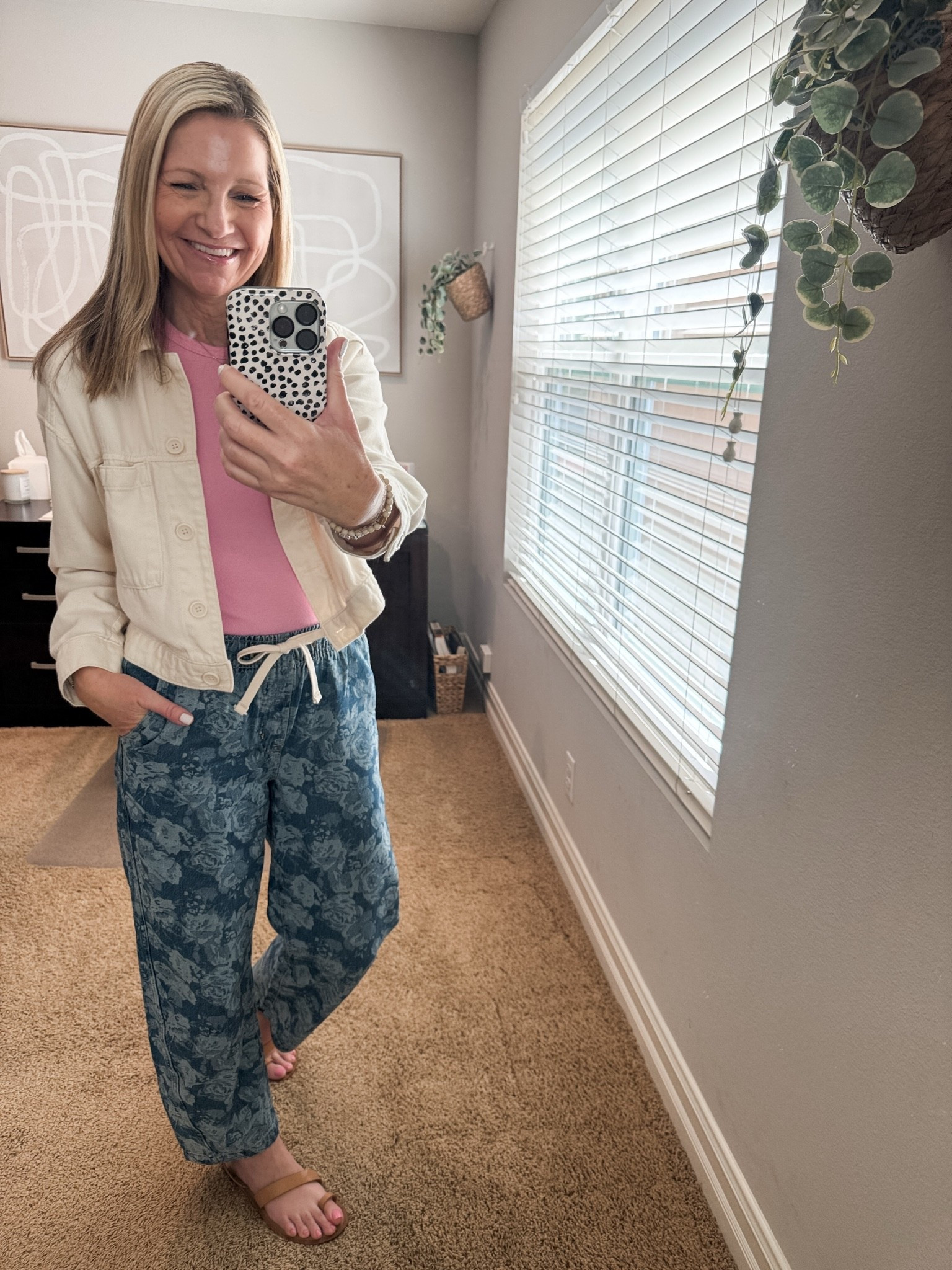 Posting my Wednesday outfit a little late. My floral barrel jeans are Gap Factory and sold out but I linked a similar options. 

My favorite tank is from Target and comes in tons of colors.

#LTKootd #LTKOver40 #LTKSeasonal