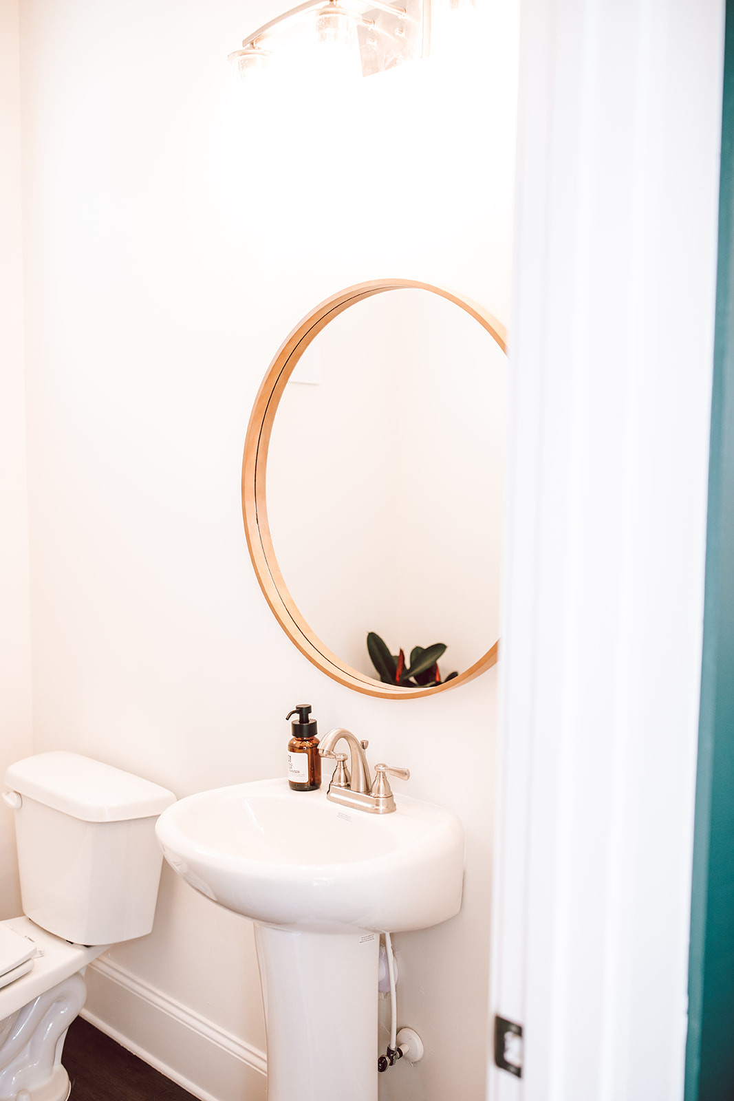 The bathroom setup that survives 100+ turnovers and still looks like this. #LTKhome 

 #LTKHome