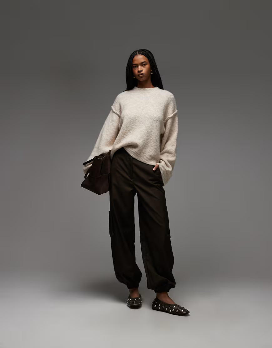 ASOS DESIGN knitted jumper with exposed seams with wool in cream-White | ASOS (Global)