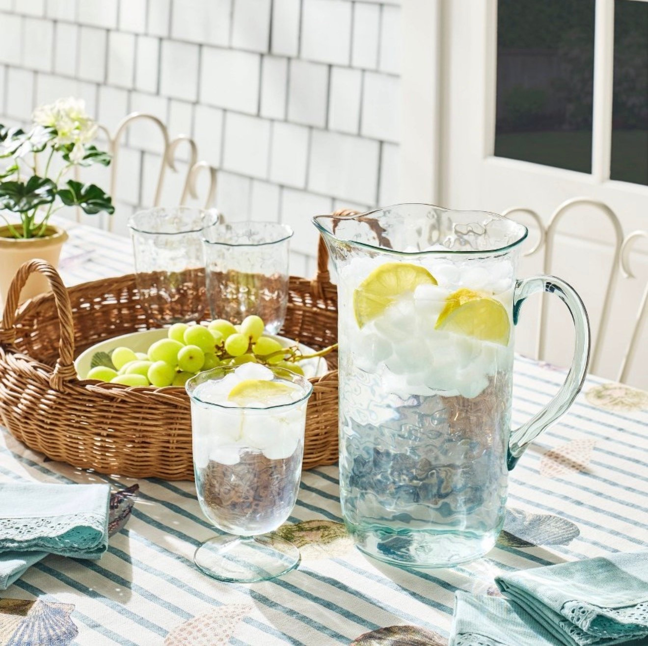 Studio McGee x Target summer hosting finds 🍋✨
coastal table setting, studio mcgee target, target new arrivals, summer entertaining essentials, glass pitcher set, blue and green decor, coastal kitchen styling, outdoor hosting ideas, neutral coastal decor, striped tablecloth, woven serving tray, casual entertaining style, lemon water pitcher, everyday glassware, budget friendly decor, target home finds, modern coastal home, summer tablescape, hosting essentials, chic outdoor dining @Target 

#LTKSeasonal #LTKHome #LTKSaleAlert