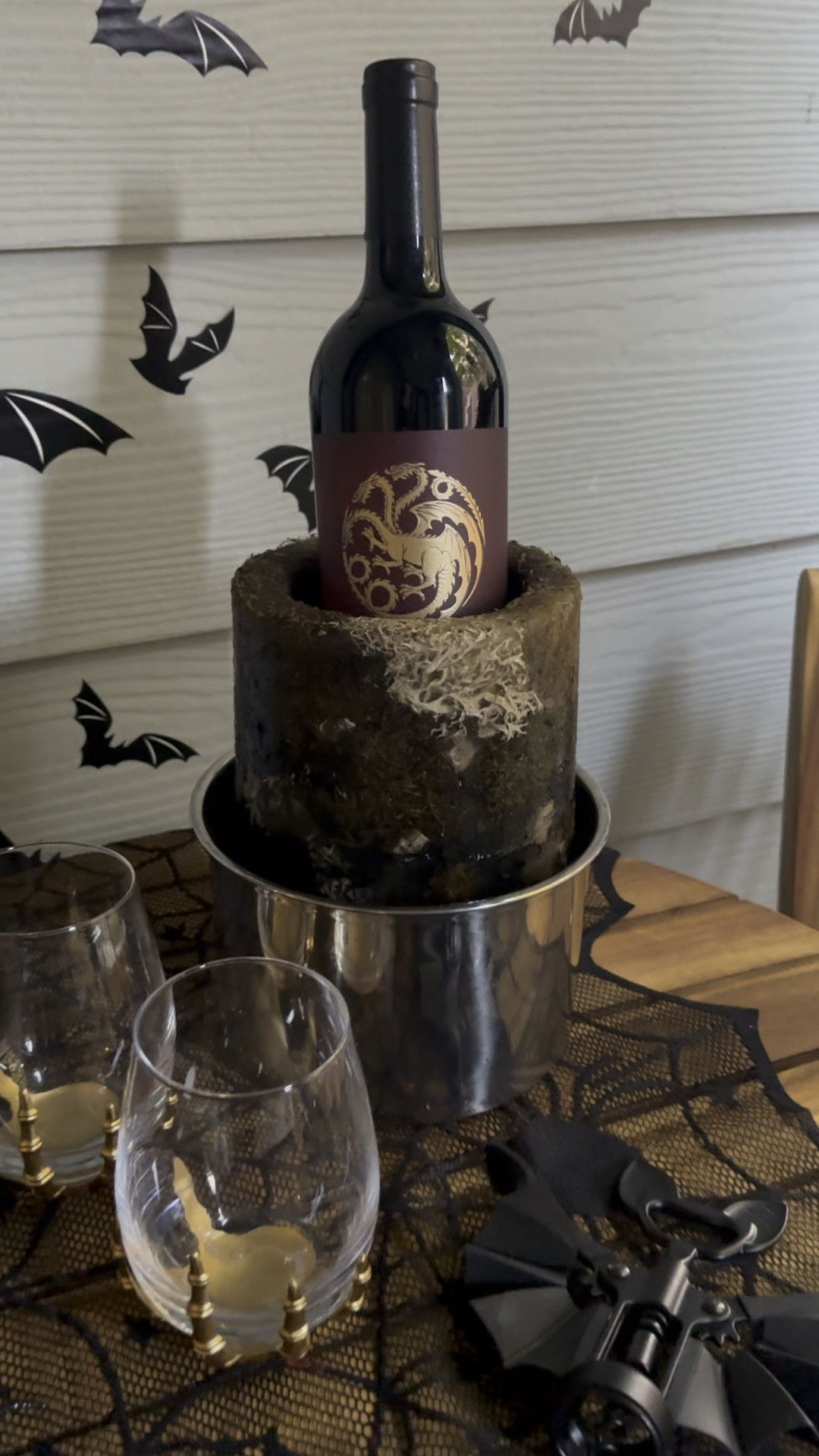 One of my FAVORITE purchases for holiday fun has been this DIY wine chiller. I added some moss and small skull heads for a spooky vibe! 💀

#LTKVideo #LTKHome #LTKSeasonal