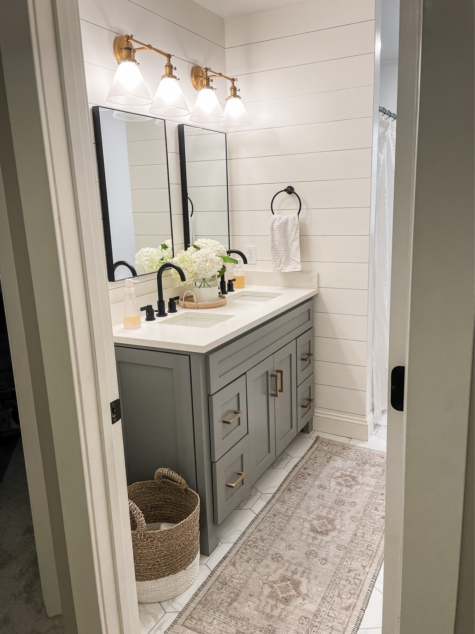 We gutted and renovated our kids bathroom for under $5k!  Here are all the product links.  

Kids bathroom.  Double vanity.  Wayfair vanity.  Kohler sinks.  Wall mounted lighting.  Bathroom lighting.  Black matte faucets.  Black vanity mirrors.  

#LTKhome