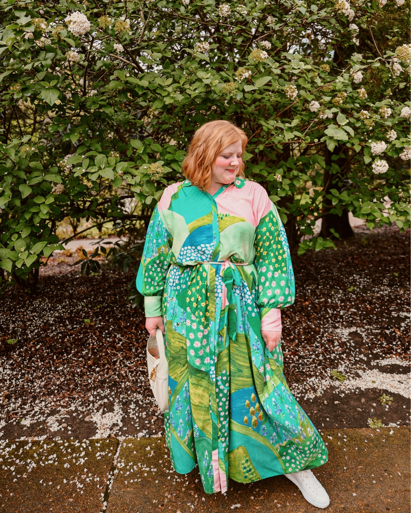 Colorful Pastel Easter Dress from Ulla Popken

This is the Mixed Print Long Sleeve Maxi Dress (sizes 12/14-32/34; $99.95) in the size 16/18. It has a more relaxed fit, but I’d still suggest going with your usual size. This is just one of Ulla Popken’s many new spring dresses, and many of the prints are just as gorgeous as this one. These soft pinks and greens are totally my colors, and I could see wearing this for Easter, spring showers and weddings, or even out and about on a weekend afternoon. The fabric is a smooth and soft viscose with no stretch. At 5’4″, it falls to the ankle on me. It’s a true shirtdress that buttons all the way up, and you can remove the sash belt or add your own for a different look. Use code LIZULLA to get this dress for just $65!

#LTKSeasonal #LTKPlusSize #LTKFindsUnder100