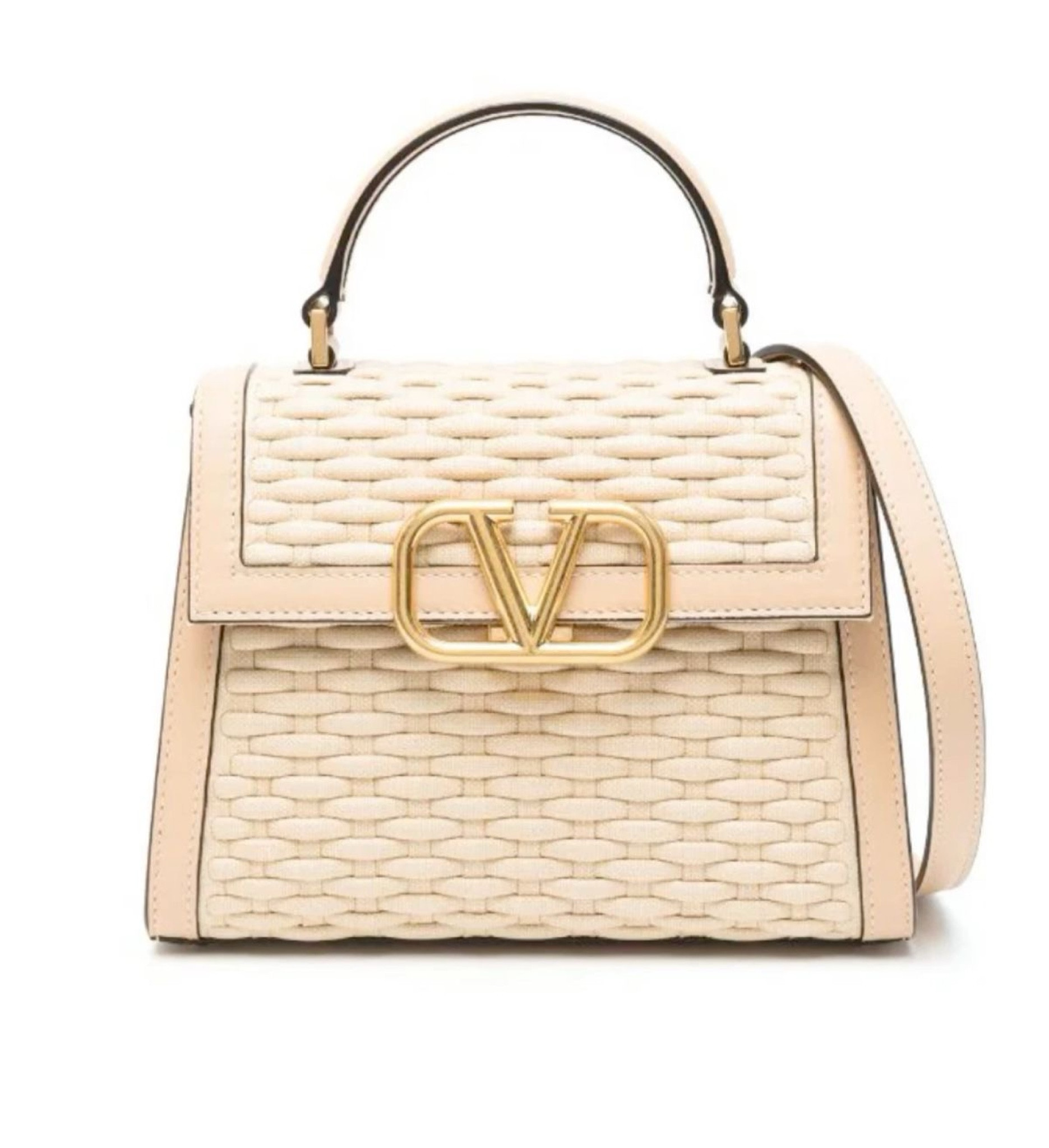 Make a statement at any event with this luxurious Valentino Garavani top handle bag. Its intricate woven design and signature VLogo emblem exude elegance and sophistication. #ValentinoGaravani #LuxuryBag #EventStyle

#LTKItBag #LTKStyleTip #LTKSeasonal