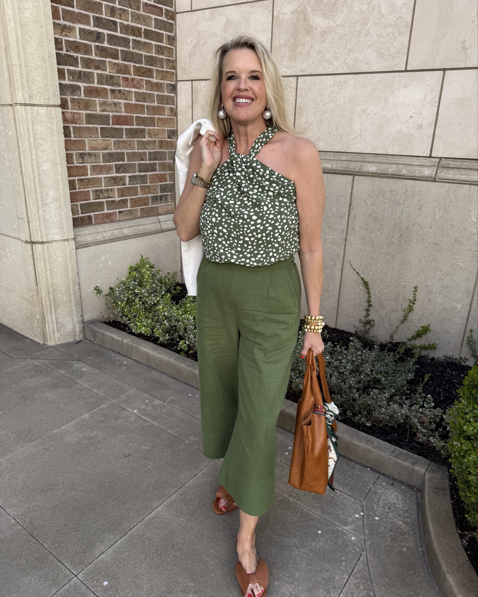 What is is about a new outfit that makes us feel so good??

I am so excited about this New Launch From GibsonLook perfect for Spring and Summer 🌷🌼

In a beautiful shade of Graff green these cute wide leg cropped linen pants with pockets and  high waisted top band , side zip 

I paired with their polka dotted halter top that has a twittered from detail and neck bow.. so cute.

Perfect pieces to dress up or down, and great for work wear with a GibsonLook Blazer …

Save 10% off with Code: DARCY10

I paired with their polka New Cecelia New York Wendy Bow sandals in cognac brown 
Save 15% off with code WENDY

And a vegan tote in Cognac brown 

Lisi lurch bracelets 

Pearl drop earrings (linked similar

2gold abbot Lyon bracelets 
#LTKWatchNow

#LTKootd #LTKOver40 #LTKgrwm