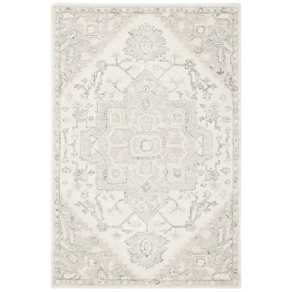 Creline Handwoven Wool Ivory/Beige Area Rug | Wayfair North America