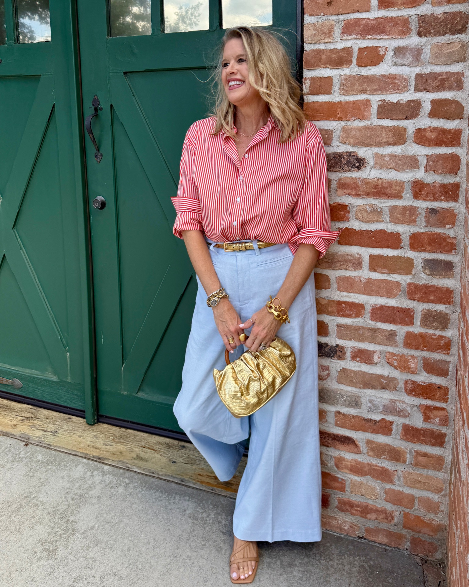 🚨Sale
Spanx outfit of the day…
Wear Now summer transition into Fall🍂

get extra 30% off several popular items on Spanx site 

Otherwise save 15% with my code:  Deardarcyxspanx 

Poppy and white striped button up… one of my favorite button ups I have in 3 colors  fits tts size for Spanx I wear a med 

🚨Linen wide leg light weight trousers, so good you’ll love them and comes in 4 colors this is the light blue wearing a med  NOW $79 in 
5 colors 

Nude  strappy sandal 
Kitten heel

Metallic gold accessories 

Gold thin belt. Old loft linked similar 

Gold metallic bag with bamboo handle an affordable finds 

Julie Vos hoop earrings ring and bracelets

#LTKOver40 #LTKootd #LTKSaleAlert