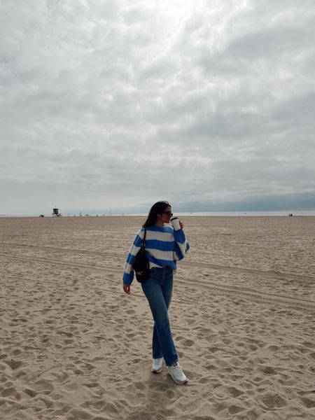 Blue sweater, oversized sweater, knit sweater, beach sweater, sweater on the beach, jeans, reformation jeans, beach pic, beach pic inspo, baseball cap info, beach aesthetic, california aesthetic

#LTKSeasonal #LTKfindsunder100 #LTKtravel