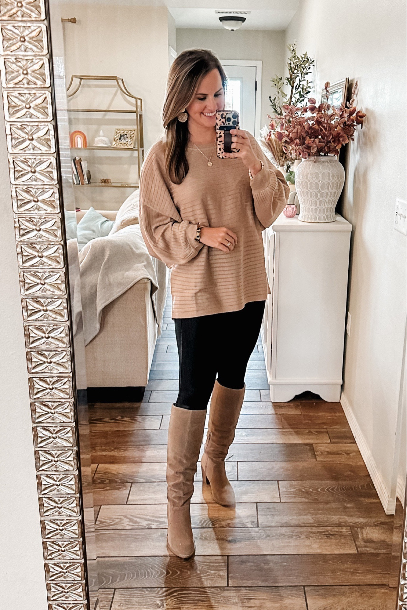 Fall outfit. The cutest neutral sweater with dolman sleeves & long enough for leggings! 👌🏼 Super soft & the cutest details. Use code DOROTHYPRO for 15% off!! 

Worn here with faux leather leggings from Amazon and knee high slouchy boots from Target! Linked below. 

Fall outfits. Mom style. Mom fashion. Fall fashion finds. Amazon finds. Spanx dupes. Black leggings. Tan tall boots. Target boots. Target style. Amazon fashion. 
Fall outfit. 

Follow my shop @dorothypro on the @shop.LTK app to shop this post and get my exclusive app-only content!

#liketkit #LTKunder100 #LTKunder50 #LTKworkwear
@shop.ltk
https://liketk.it/3S3j5