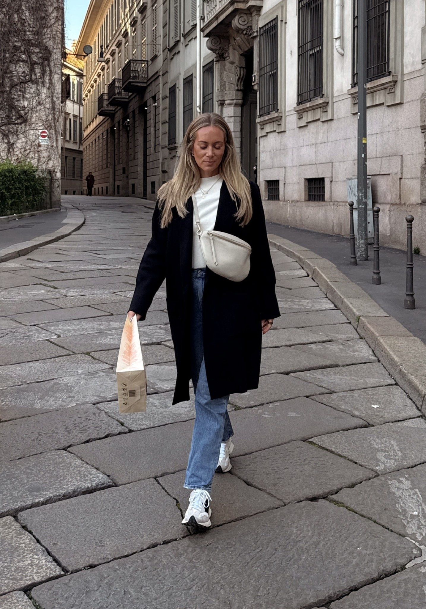 Milan day look 🤍 Ribbed fitted turtleneck, Amazon sweater coat, @abercrombie  High Rise 90s straight jeans, @giginewyork Beck Sling bag and the best New Balance 327s.

Such a good outfit for travel days and wandering around the city.

Milan outfits, Milan travel style, European outfit, Milan street style, Milan fashion inspiration, effortless outfit, sightseeing outfit, timeless style

#LTKootd #LTKTravel