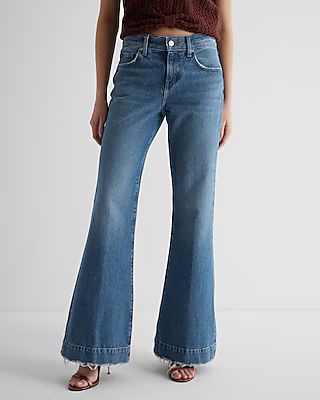 Mid Rise Medium Wash Raw Hem '70s Flare Jeans | Express