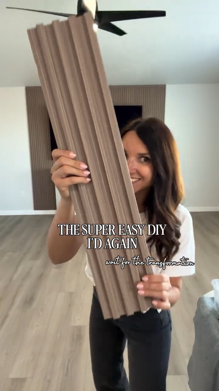 This blank wall in our Airbnb was begging for a little personality—and these affordable wood-look slat panels completely transformed it! They gave us that warm, custom designer look without expensive materials, demolition, or hiring a contractor.

We later added the electric fireplace, and together they created the coziest modern focal wall. It looks high-end, adds so much texture, and made the entire room feel intentionally designed. This is one inexpensive DIY wall makeover I would absolutely do again!

Affordable wall makeover, DIY accent wall, wood slat wall panels, electric fireplace wall, Airbnb design ideas, modern organic home decor, budget-friendly home improvement, designer look for less.

#LTKOver40 #LTKHome #LTKvlog