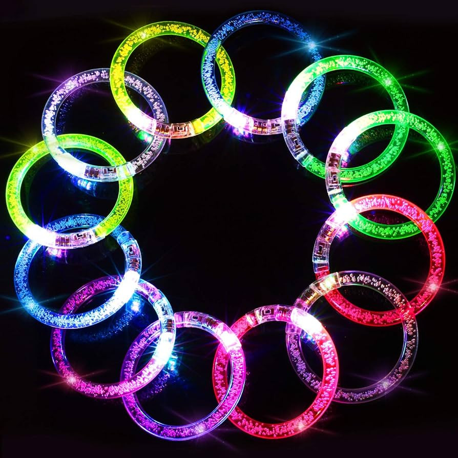 Novelty Place 12Pcs LED Glow Bracelets Set - Light Up Party Favor Toys Glow Sticks for Kids and A... | Amazon (US)