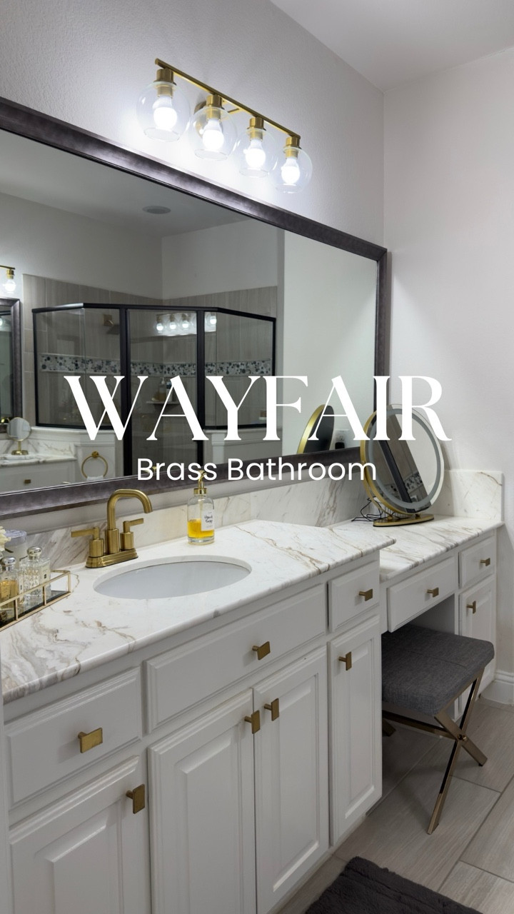 Comment “Bathroom” and I’ll DM you a link to all my bathroom finds from @wayfair 

How I customized my Master Bathroom uses various brands

Swapped out the builder grade bathroom accessories with gold accessories that I liked and were on sale:

1. Changed the light fixtures
2. Upgraded the faucets
3. Changed out the hand towel rings 
4. Changed the shower system - that’s a long story

Added cabinet hardware @cb2
Changed out the towel rack @cb2 

#bathroomupgrades #bathroomdiy #bathroomfixtures #bathroomtransformation #bathroomaccessories