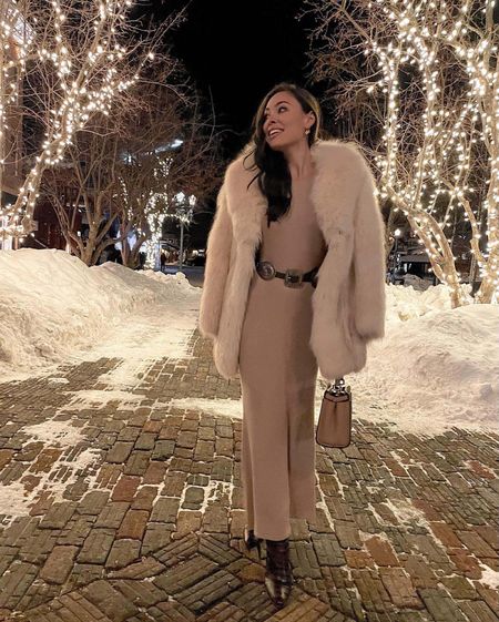 Kat Jamieson of With Love From Kat wears a winter outfit. Maxi dress, white faux fur coat, western belt, Aspen style.

#LTKSeasonal