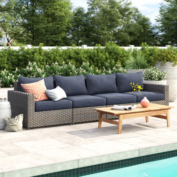 Kordell 118'' Wide Outdoor Wicker Patio Sofa with Cushions | Wayfair Professional