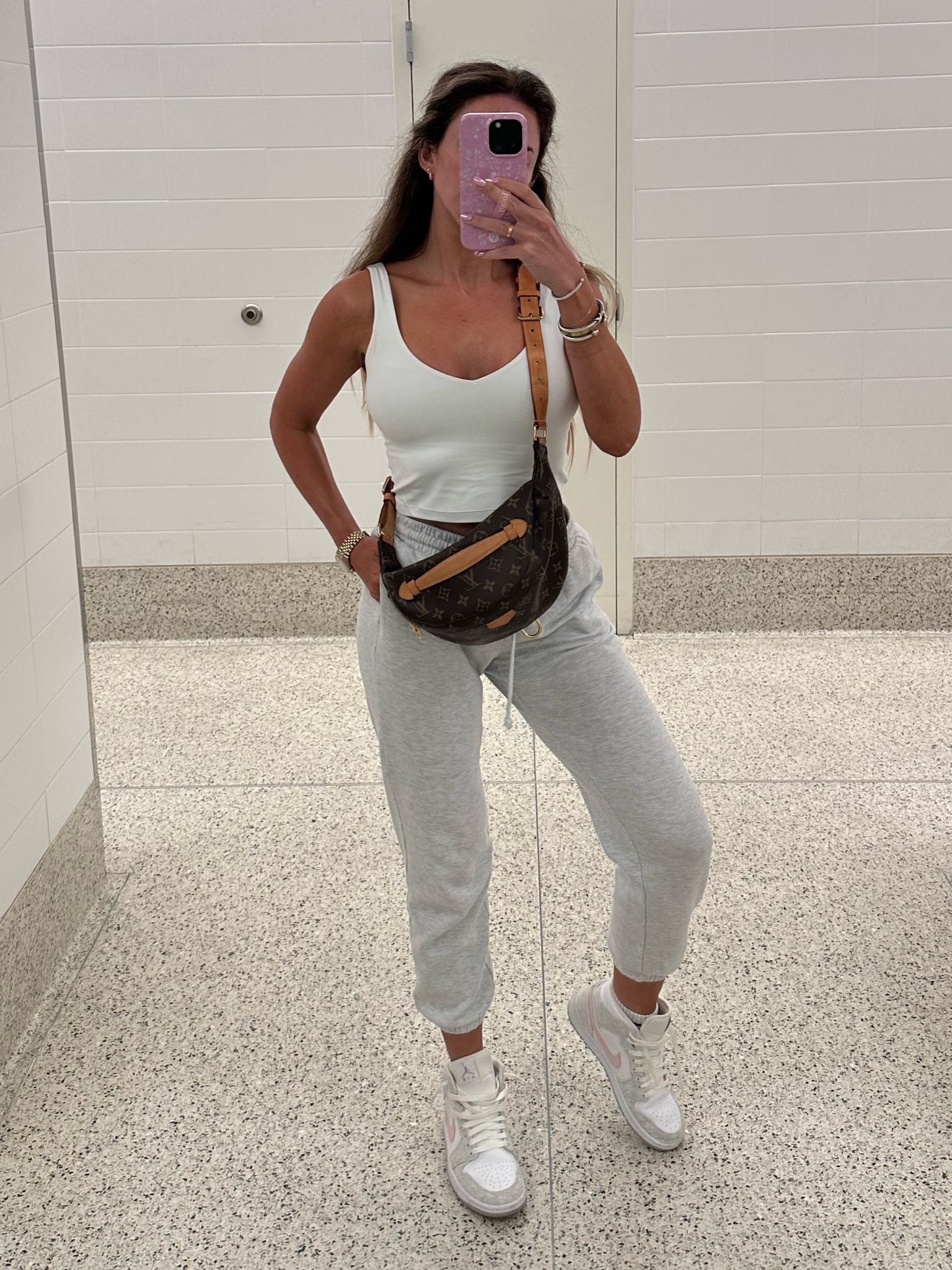 Travel outfit 
Airport outfit 
Joggers - small 
Tank - 6 
Sneakers - TTS 

#LTKunder50 #LTKtravel #LTKfitness