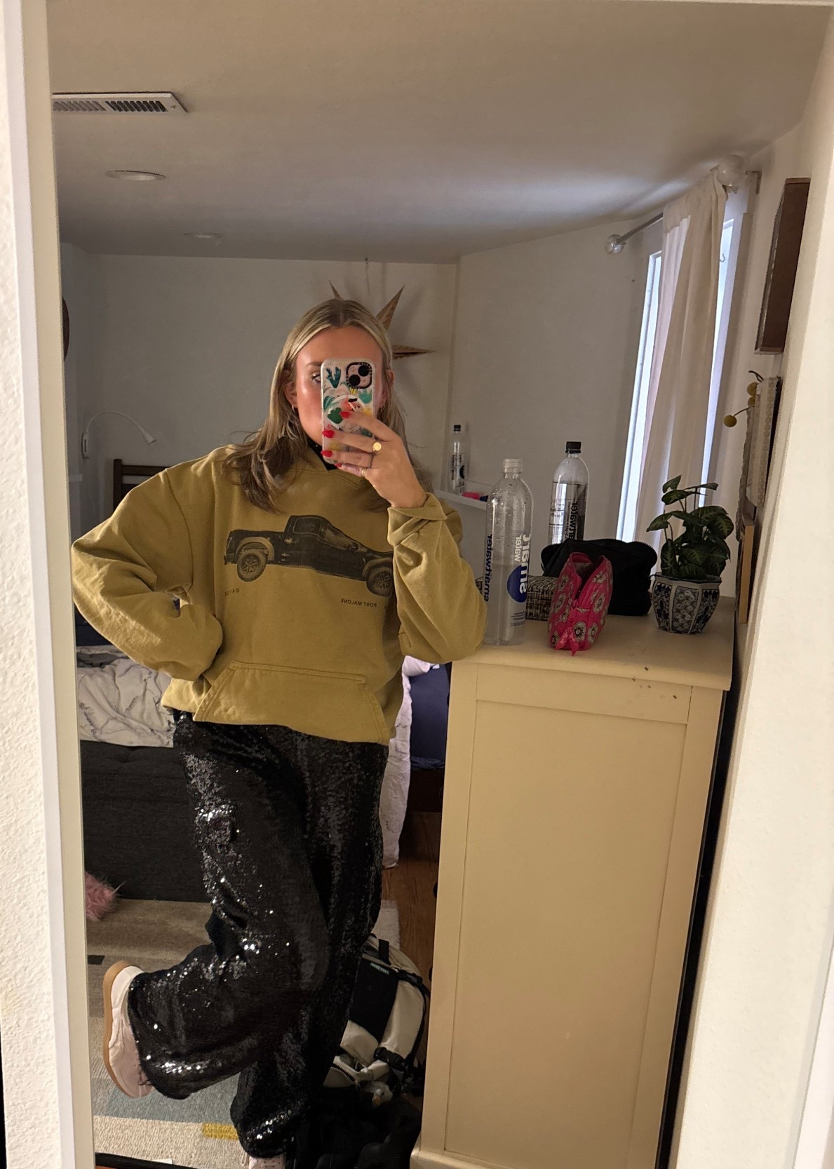 Fall browns with sequins are the perfect combo for chilly fall concerts. Being at Red Rocks, I knew layering would be the key to stay warm during a chilly October night! I started with a cropped turtleneck, a short sleeve, then a thick hoodie to tie it alll together. You would never know I wore leggings under my sparkly pants, either! 

#LTKStyleTip #LTKSeasonal #LTKTall