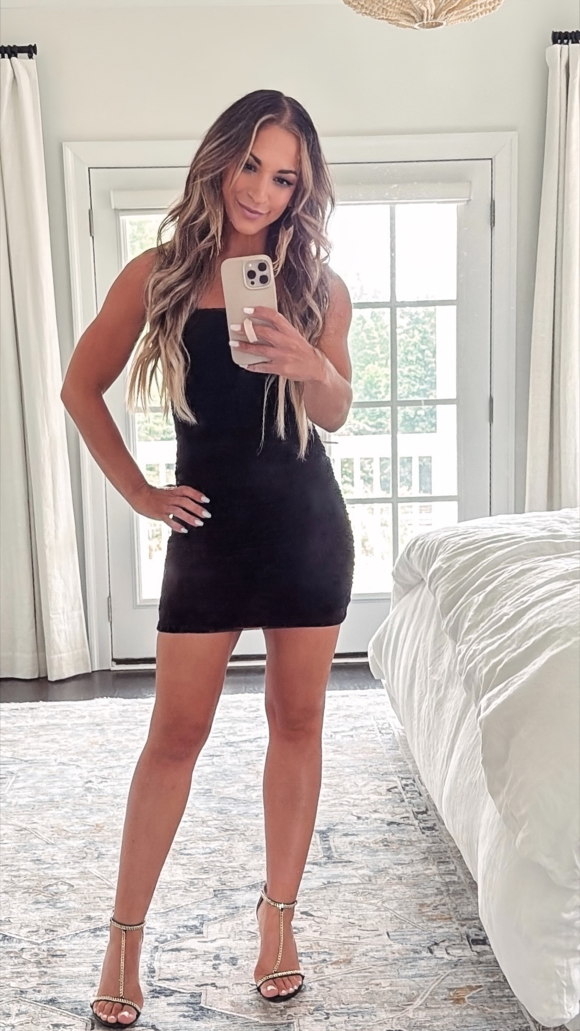 LBD. Little black dress. Ruched dress. Mini dress. Date night. Black strappy sandals. Black and gold sandals. Gold tassel earrings.

#LTKSaleAlert #LTKShoeCrush #LTKFindsUnder50