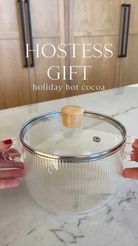 GIFT \ Hostess hot coca holiday giftie🎁 Here’s the setup👇🏻
+ ribbed pot $25
+ holiday mug
+ cocoa mix
+ fa la la tea towel 
+ Christmas marshmallows
+ faux pine stems 
+ velvet ribbon bow 


#LTKHoliday #LTKVideo #LTKGiftGuide