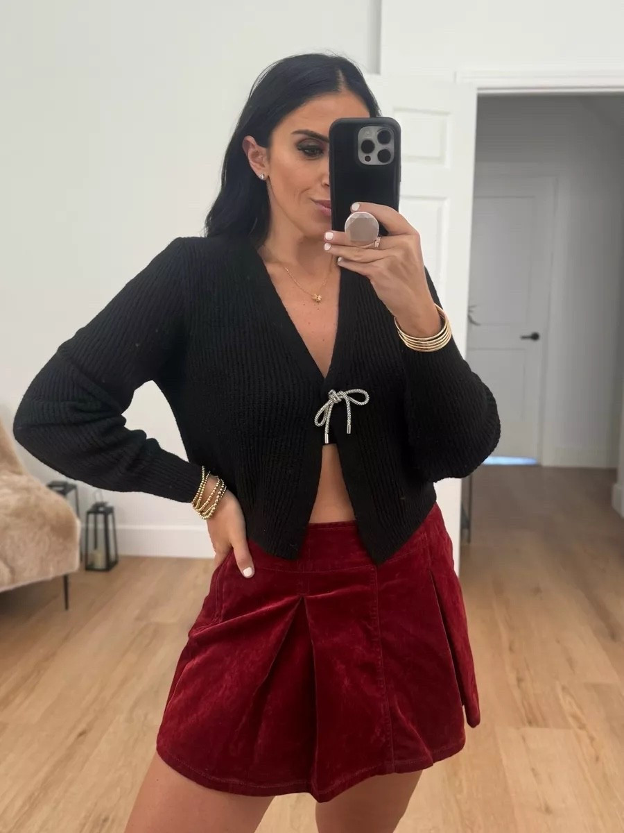 Madden NYC Women's Flocked Pleated Mini Skort wearing size medium only $14. No Boundaries Bow Cardigan wearing size medium only $14

