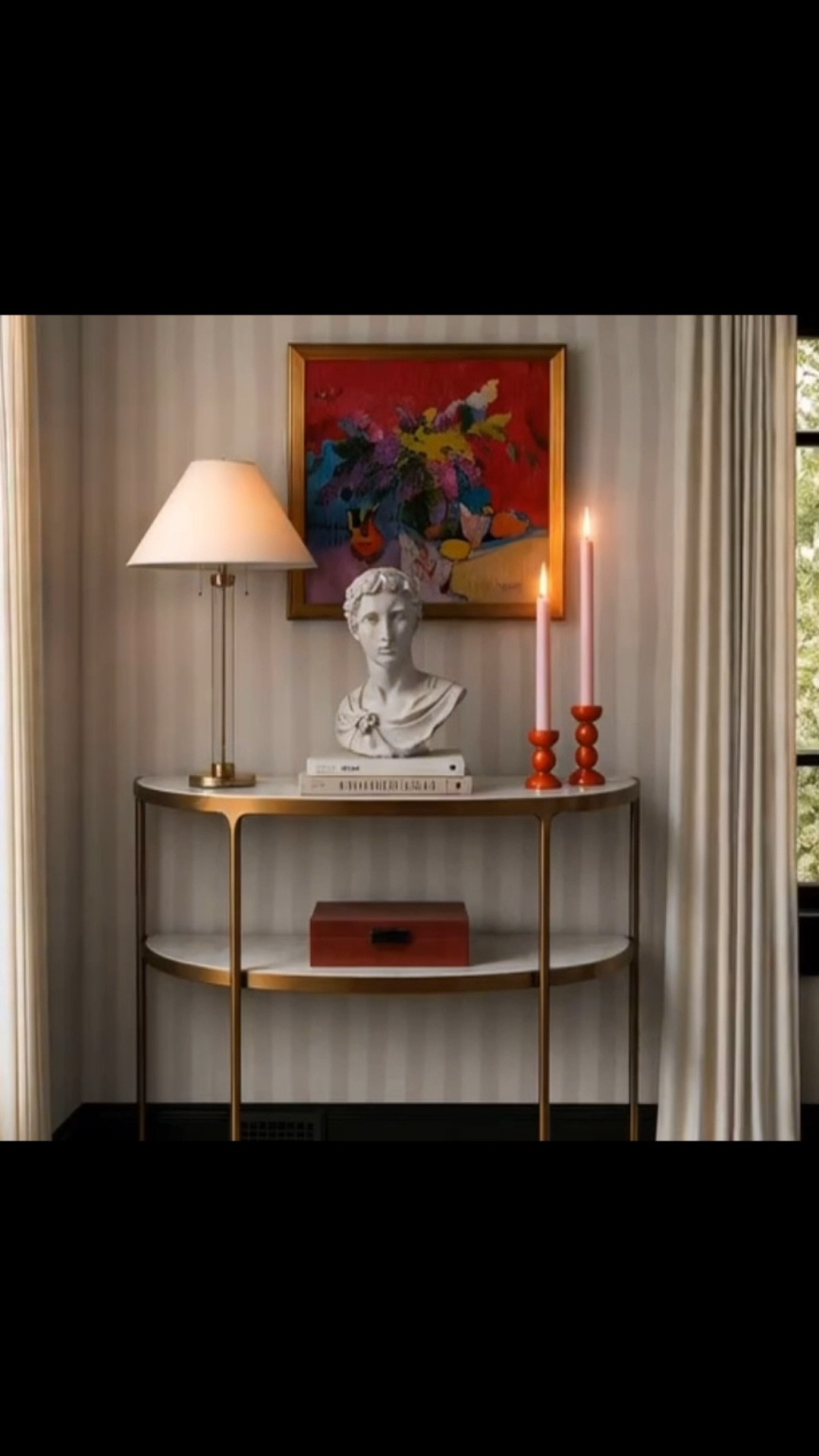 A thoughtfully styled corner can completely change how a home feels. The striped wallpaper adds personality, the modern classic console brings elegance, and the artwork creates that collected, lived-in charm. Layer in an elegant table lamp, timeless sculpture, and statement candle holders, and suddenly it becomes that perfect vignette to pause, reset, and simply enjoy being home. Not every corner needs a hard function—sometimes beauty is the function. Though this one can absolutely display art, books, and the pieces you love most.

#stripedwallpaper #wallpaper #consoletable #entrywaydecor #vignette #homedecor #modernclassic #artwork #tablelamp #sculpture #candleholder #interiordesign #entrywaystyling #homedetails #luxuryhome #ltkhome

#LTKdayinmylife #LTKHome #LTKSaleAlert