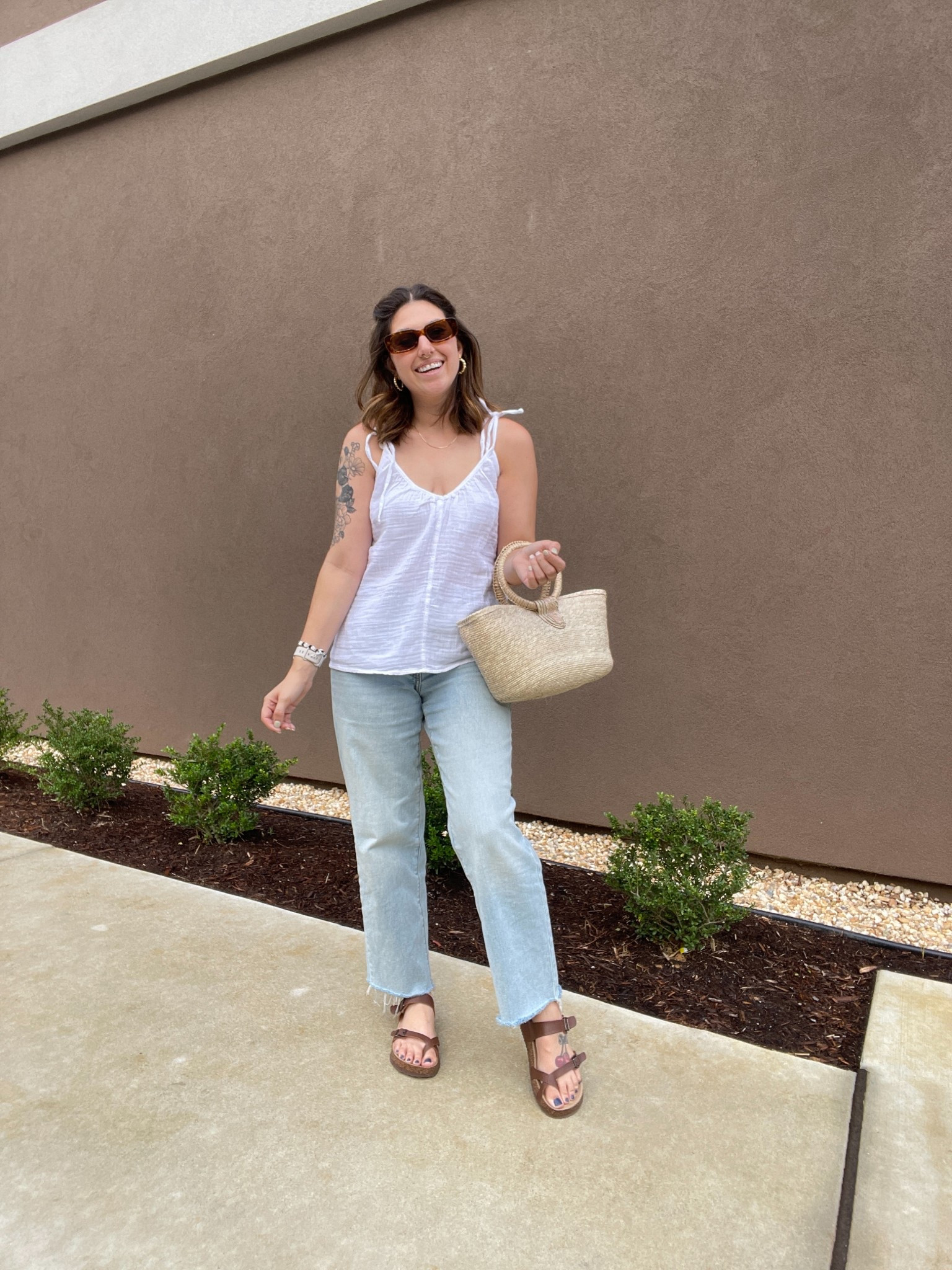 women's casual summertime outfit, summer fashion, light wash loose jeans from Old Navy I cut them to fit length wise, Brown sandals, white gauze top originally from Old Navy but I linked similar ones, Rectangle sunglasses from amazon, and a straw purse. #ltkcasual #casualoutfit #casuallook #summerlook #summerfashion #summerstyle #amazon #oldnavy  

 #LTKSeasonal #LTKFindsUnder50 #LTKStyleTip