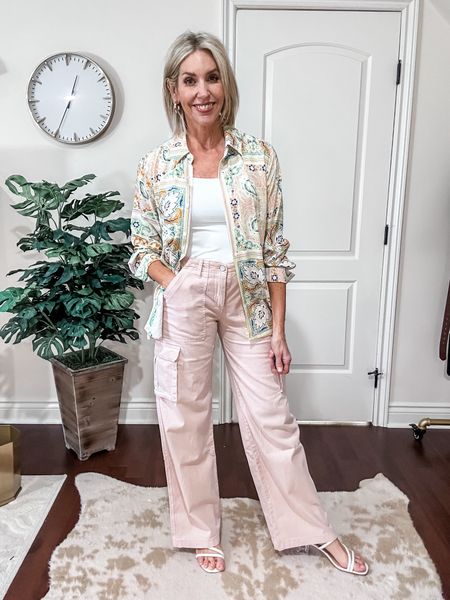 Pink Cargo pants with this gorgeous button down. Perfect for spring. I paired it with a fitted top to balance the proportions. Fit is true to size and cargos come in other colors. 

Over 40, cargo pants, pink pants, spring outfit 

#LTKover40 #LTKstyletip #LTKSeasonal