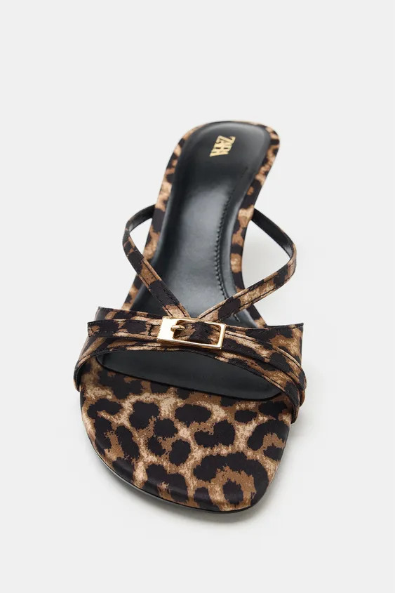 Fabric heeled sandals with an animal print. Strap details with metal buckles at the front. High t... | Zara US
