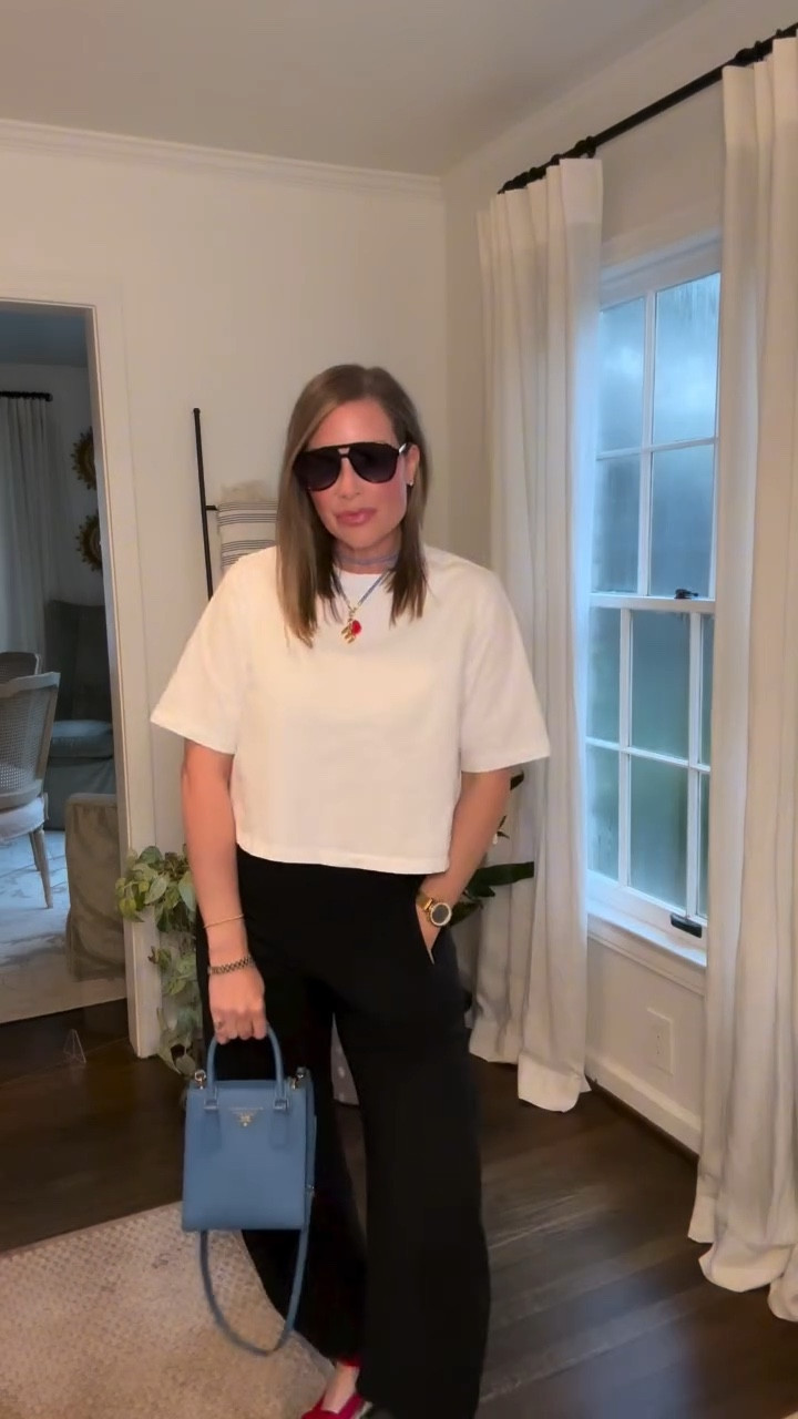 The viral pants I reach for when I want effortless but polished!

My favorite everyday pants styled with a mix of high | low pieces. Easy workwear, travel ready, or carpool cool.😎 

Comment AMERICAN GIRL and I’ll send the links to everything in this look. ❤️🩵

@Vivrelle  Prada Crossbody
@hm aviators
@roxanneassoulin  corded custom charm necklace
@kissmekatejewelry two toned watch band
@amazonfindsandfashion  stainless pedometer watch 
@oldnavy T
@Ruti  pants
@loefflerrandall espadrilles 

everyday outfit formula, elevated basics outfit, casual workwear inspiration, high low fashion styling, travel outfit ideas women, chic mom style, wide leg black pants outfit, effortless polished outfit, affordable luxury fashion mix

#LTKWorkwear #LTKTravel #LTKootd