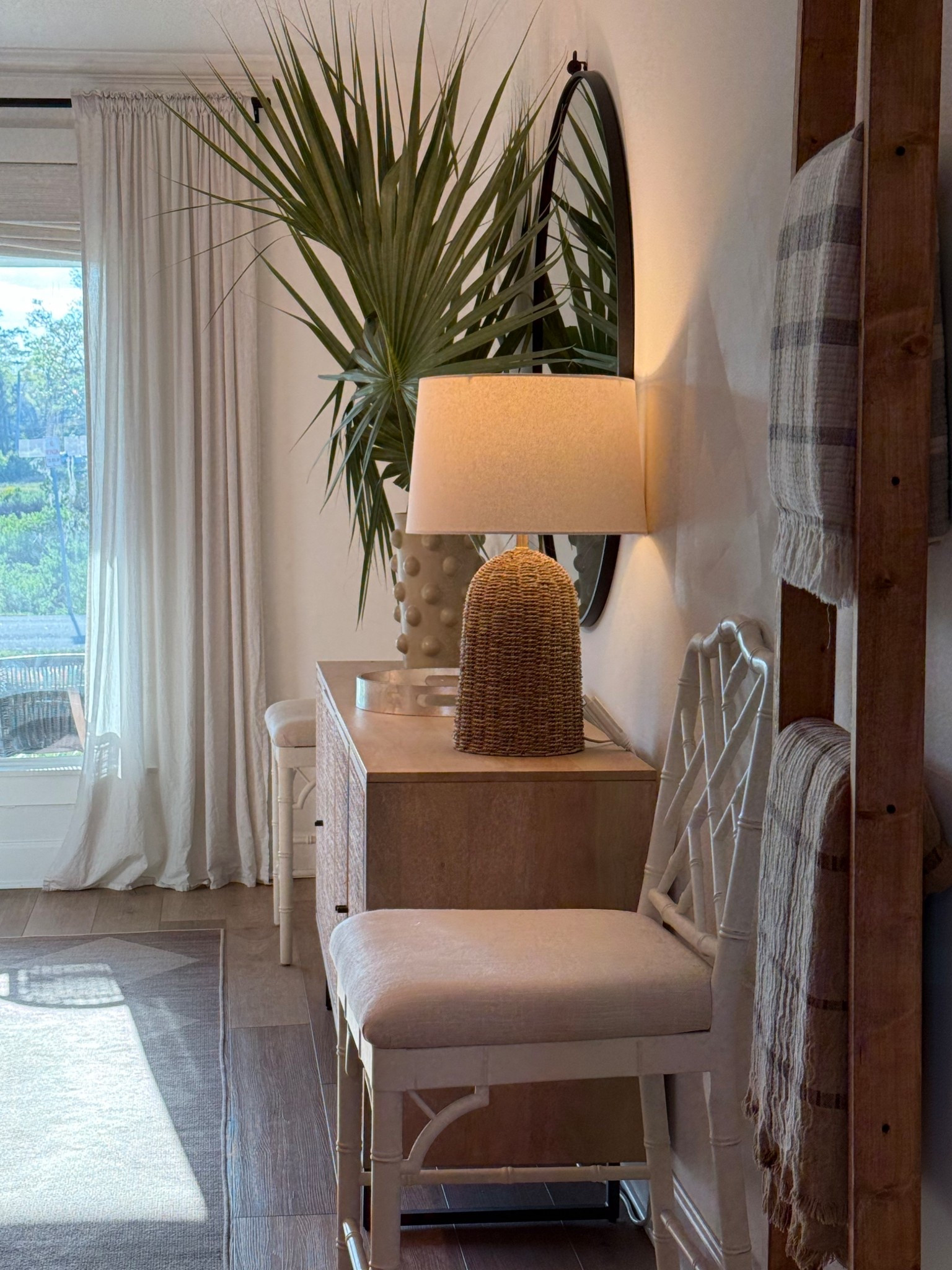 Dining room design coastal decor home interior cane console table cabinet woven lamp round mirror 

#LTKHome #LTKSaleAlert