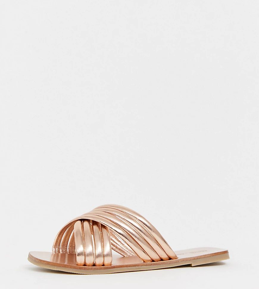ASOS DESIGN Wide FIt Falsetto cross strap flat sandals in rose gold | ASOS (Global)
