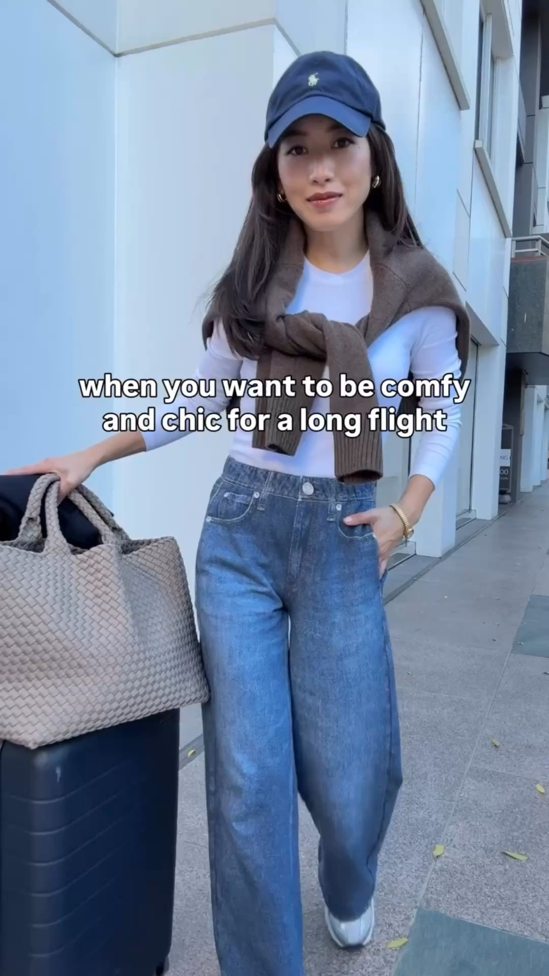 Comfy airport outfit 

Linked exact R&B Miramar sweatpants and a lower priced Gap jean I own with elastic waist (gap XSP is a loose fit on me). 

• Aritzia double face wool coat xxs - lightweight & unlined. 

• Rag & Bone Miramar wide leg pants in XXS , shrunken in dryer and then hemmed. stretch pull on waist. Petra wash. 

I shrunk the length by drying in machine dryer then hemmed an inch. 

I Also linked the R&B Miramar Andi 26.5” cropped style I love that does not need hemming or shrinking. Also love the Miramar Sofie ankle style which I shrunk in length to 27.5” by machine drying. 

• Aritzia HomeStretch ribbed long sleeve tee I size up to XS

• Quince Mongolian cashmere oversized crewneck sweater xs, relaxed boxier cut

• New Balance 530, a big kids 4 = womens 6

• Naghedi medium tote in cashmere

• Away the bigger flex carry-on suitcase, lightweight, roomy size and durable. I've traveled a lot with this.

• look 2 Steve Madden boots 5.5 super comfy

• quince navy sweater Xs shrunken fit

• Polene Beri black bag not linkable 

Airport travel outfit, sweatpant jeans, petite friendly

#LTKPetite #LTKootd #LTKTravel