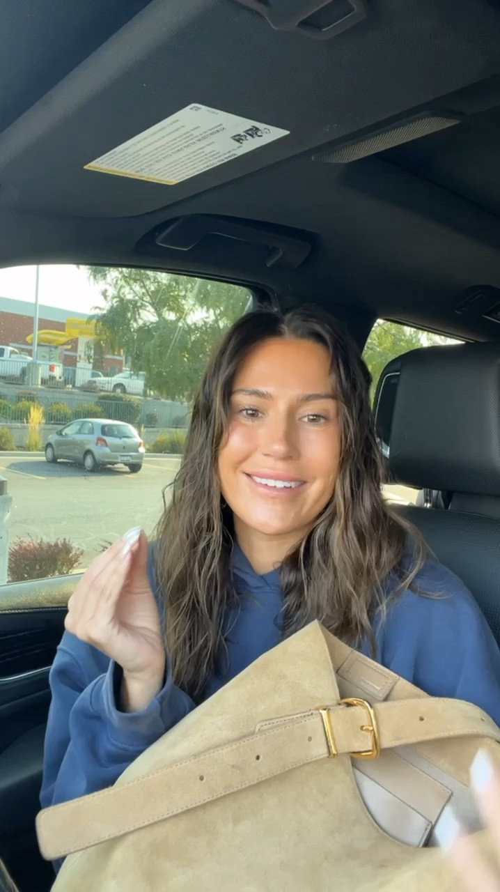 This under $200 suede bucket bag is on my list of fall essentials!  I would put it in a capsule wardrobe list of “must haves”. You can wear it dressed up with a nice dress or casual with sweats and jeans. The suede texture and gold hardware makes it look so high end. And big enough to hold the essentials, including your laptop 🙌🏼

Fall bag, fall purse, bucket bag, bucket tote, Madewell tote, Madewell bucket bag, brown suede bag, brown bag, fall fashion, fall style, Christine Andrew 

#LTKSeasonal #LTKItBag #LTKVideo