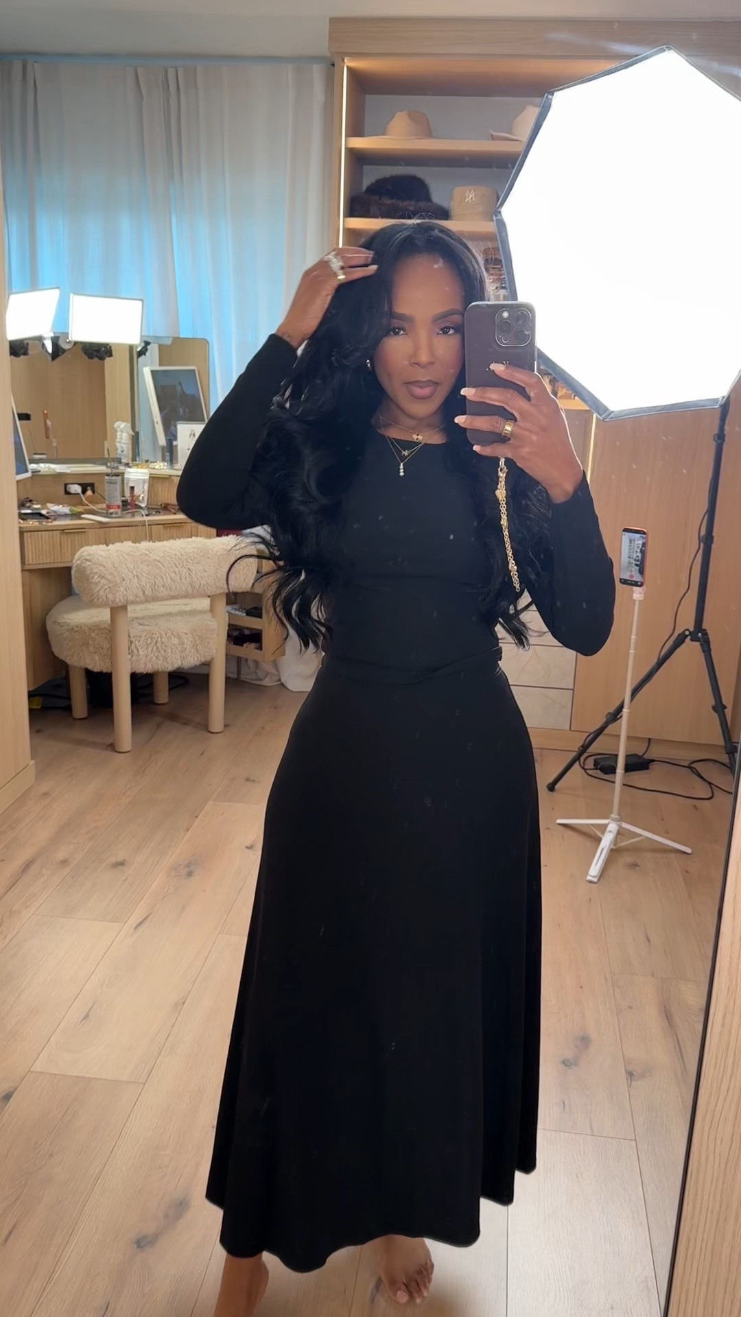 Sleek, timeless, and effortlessly chic — a classic black midi dress that does it all. The clean lines and flattering fit make this one of those pieces you’ll keep reaching for season after season. Styled simply, but powerful enough to stand on its own.

Perfect for date night, evening events, dinner plans, or an elevated everyday look.

📏 Sizing:
Wearing size Small  
Height: 5'4"  
Weight: 138 lbs  
Bust: 34D  
Waist: 27"  
Hips: 40"

A true cost-per-wear staple — easy to dress up with heels and statement jewelry or keep minimal for a refined, long-term wardrobe investment.

Classic black dress, minimalist outfit, elevated basics, chic evening look, versatile midi dress, timeless style, capsule wardrobe essential.

Follow me on Instagram and YouTube @kiras