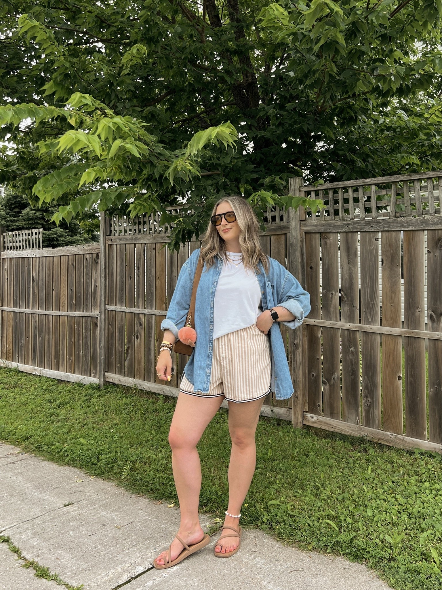 Comfy summer late summer to early fall outfit! Wearing my usual size L in the denim shirt and striped shorts. Linked similar white tee. I’m a 9.5-10 shoe and wear a 10 in the Crocs sandals. Canadian Old Navy and Crocs links are under “similar products”

#LTKsummer #LTKmidsize #LTKfall
