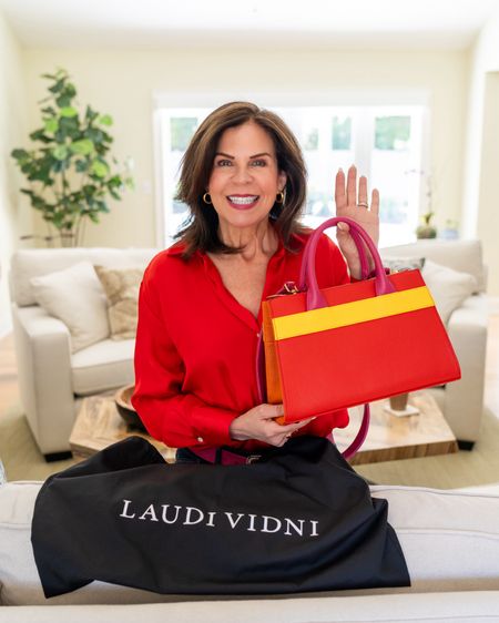 OK, how fabulous is this Courrant carryall bag from Laudi Vidni? 
💕💕

Wait, who’s Laudi Vidni? 🤔

Laudi Vidni is actually the word individual, spelled backwards, and that’s the whole idea behind these bags - this is not the IT bag, this is the YOU bag, where you get to customize it in your favorite colors, patterns, leathers, and styles.💕

All you do is hop online, choose a bag, and get creative. So I chose the Courante Carryall, and then I started designing. 😊

Say goodbye 👋🏻 to the same bags that everyone else owns and say hello 👋🏻 to your own customized bag.💼 

Perfect gift idea 🎁 for Mother’s Day or any day of the year! It does take three weeks to get your custom bag, so if you choose this as a Mother’s Day gift, make sure the recipient is aware. 💝 

Right now @laudividni is offering 10% off gift cards through Mother’s Day so it’s a perfect time to purchase one! 💕💕

@Shop.LTK, #liketkit and liketk.it/xx

#PurseAddict #Customized #GiftIdeaForHer #laudividni 


#LTKsalealert #LTKGiftGuide #LTKitbag