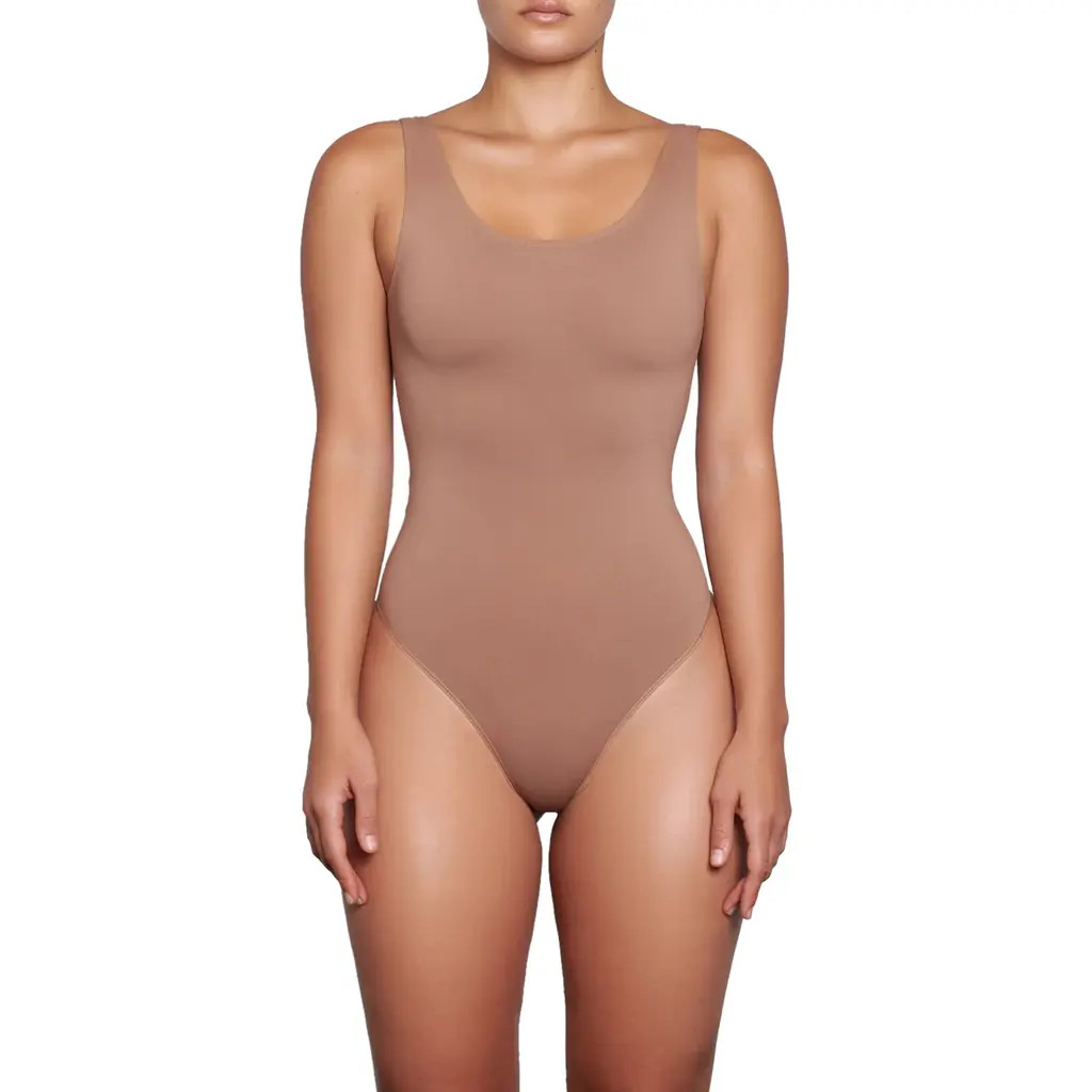 SKIMS Soft Smoothing Seamless Thong Bodysuit in Sienna at Nordstrom, Size X-Small Regular | Nordstrom