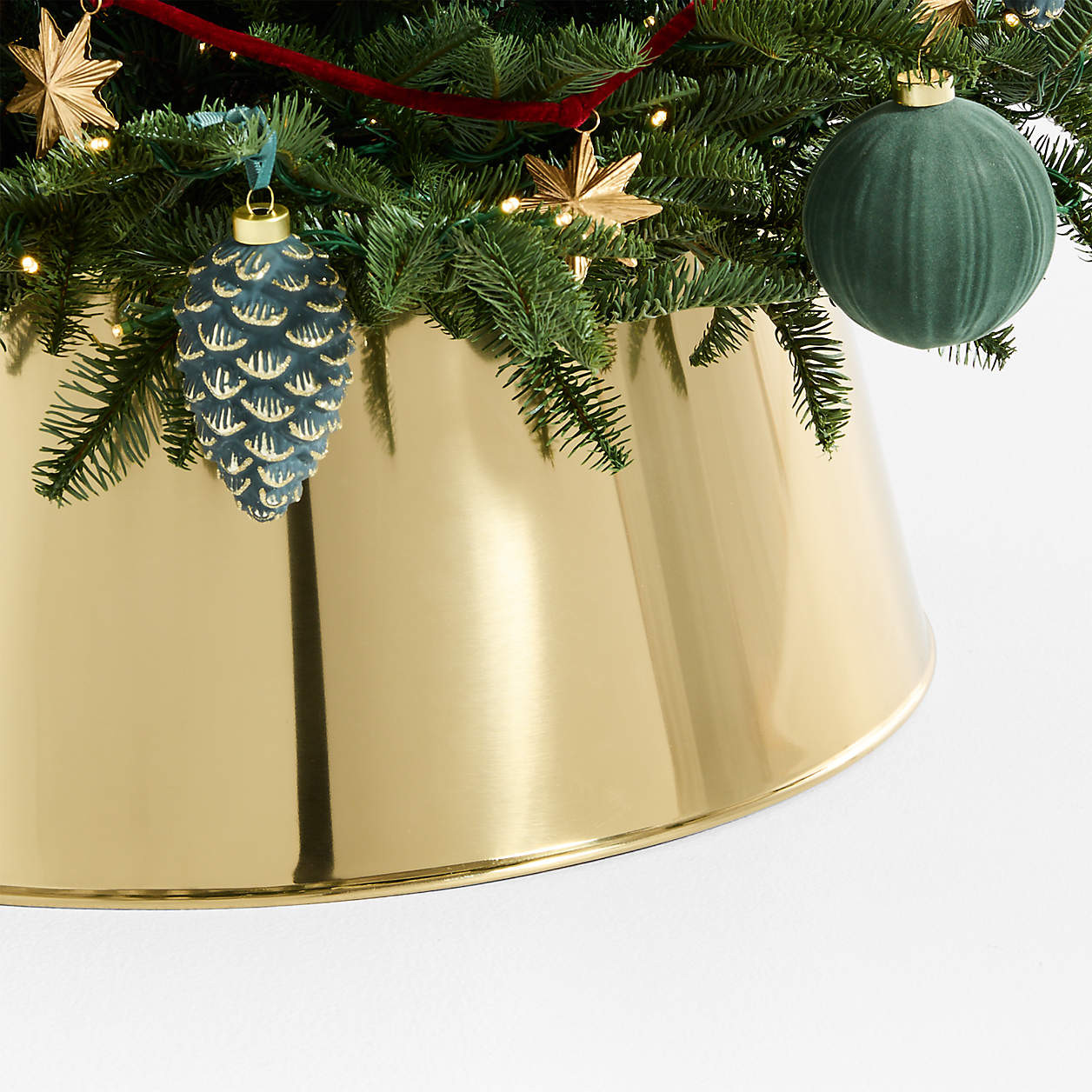 Polished Brass Metal Christmas Tree Collar 27" | Crate & Barrel | Crate & Barrel