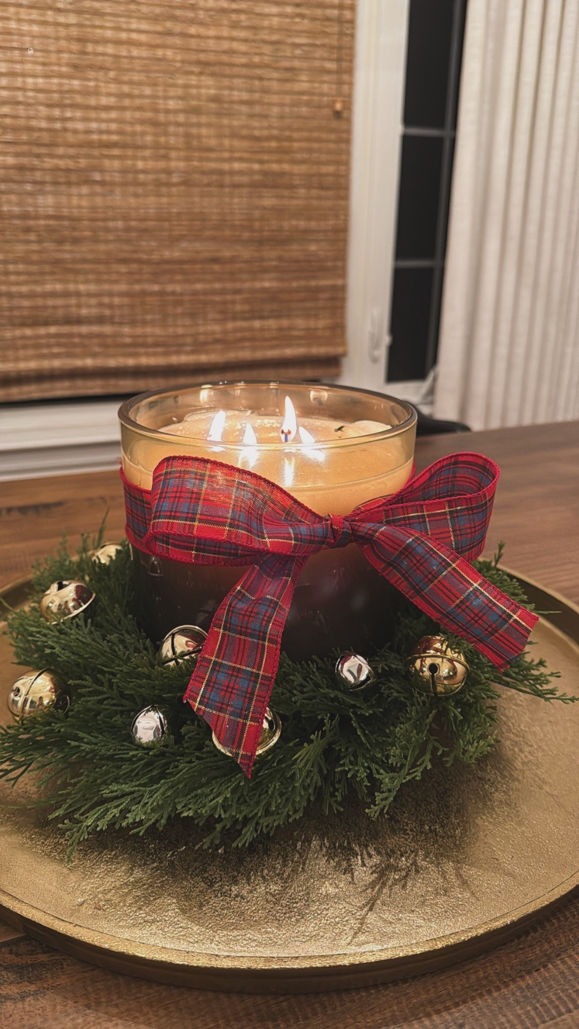 Kitchen table centerpiece idea for Christmas! Walmart holiday candle + Target mini cypress wreath . Ribbon is old from Sam’s club 

#LTKHome #LTKSeasonal #LTKHoliday