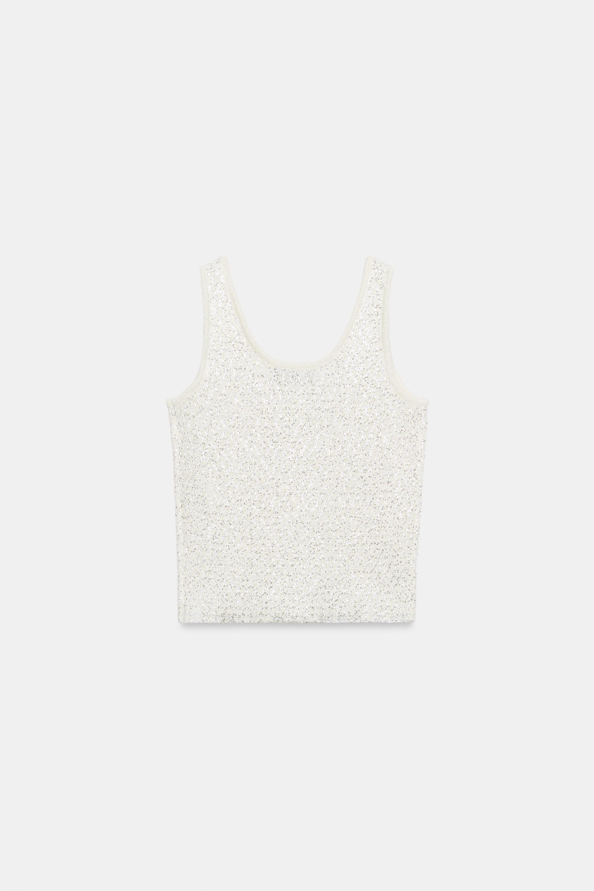 Top mit Pailletten und Metallic-Garn. Rundhalsausschnitt und breite Tr\u00e4ger.Cremefarben9598/0... | Zara DE