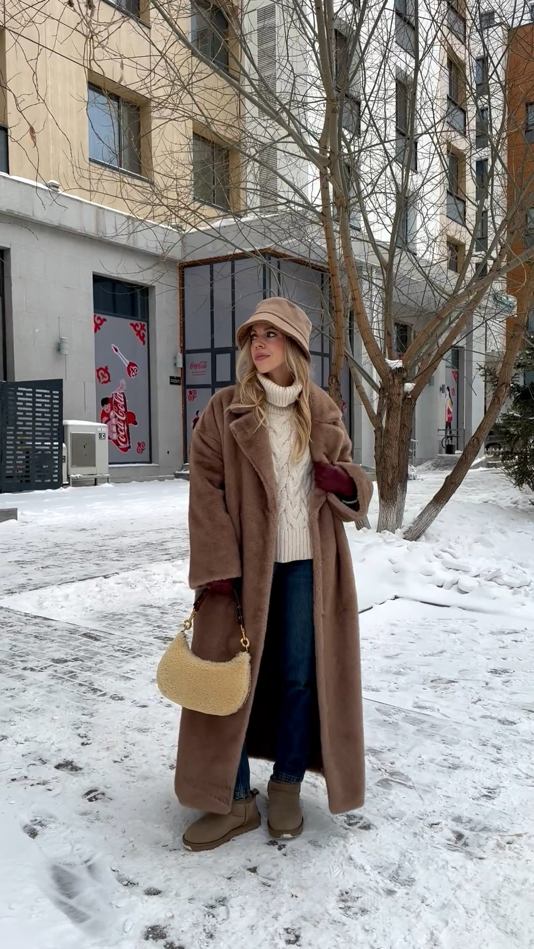 Cozy Christmas shopping look, camel fur coat, shearling bucket hat, cable knit sweater, Zara mom jeans, Ugg ultra mini boots, shearling handbag 

#LTKSeasonal #LTKHoliday #LTKFindsUnder50